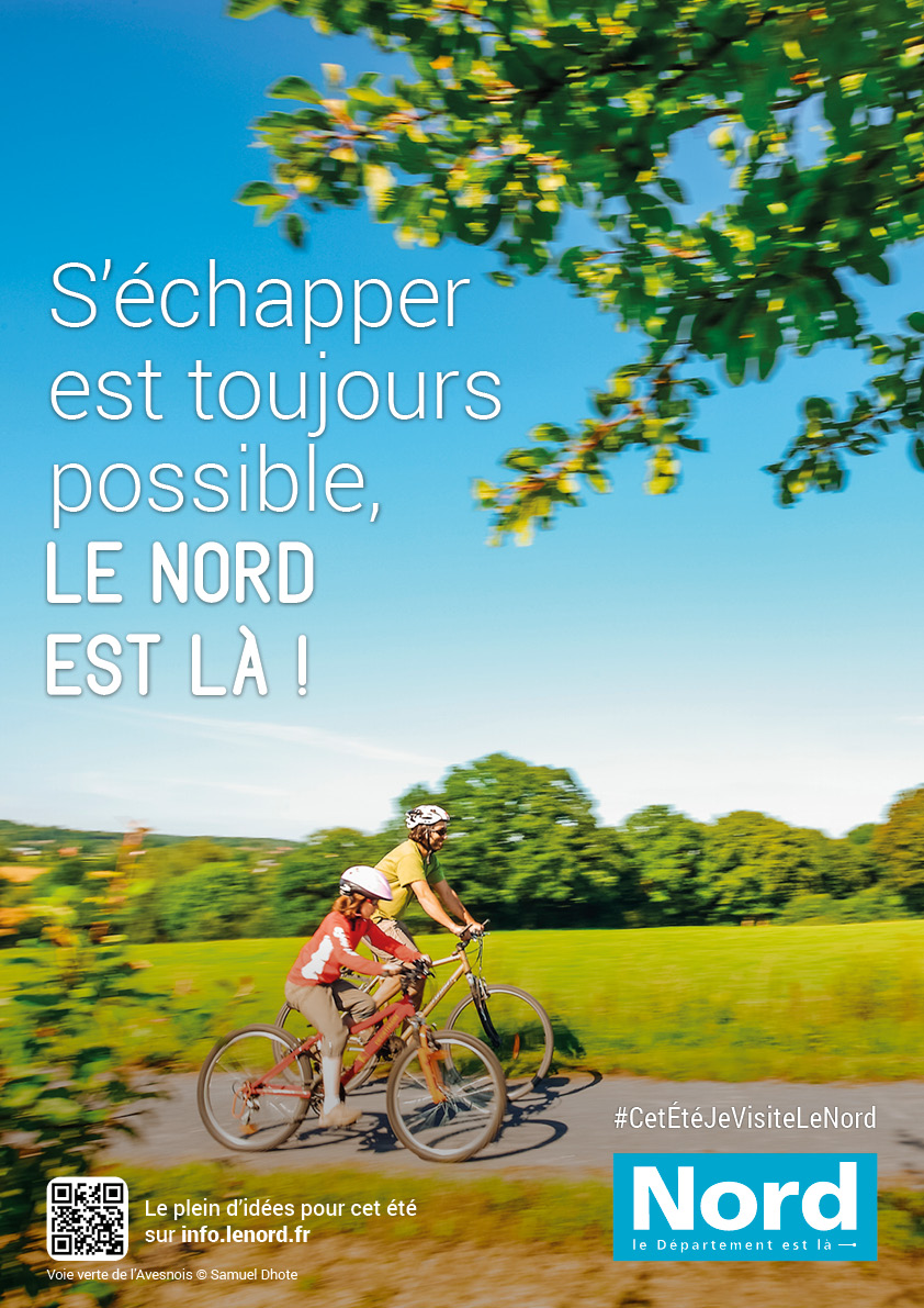 tourisme dans le Nord. voies vertes de l'Avesnois, un père et son fils font du vélo